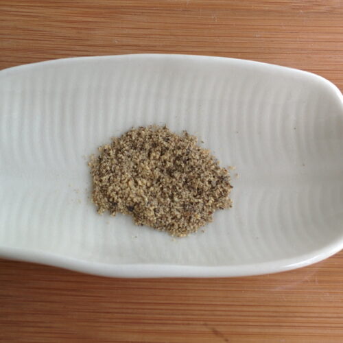 Black pepper powder – illustrative food photograph Illustrative Black pepper powder photograph, not actual Naativa Ruchi packaging