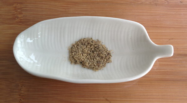 Illustrative Black pepper powder photograph, not actual Naativa Ruchi packaging