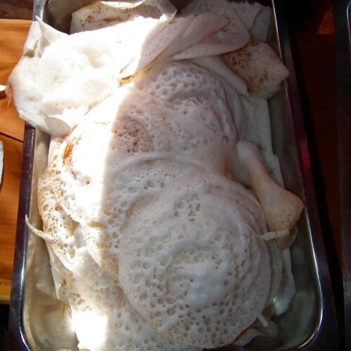 Illustrative Appam photograph, not actual Naativa Ruchi packaging
