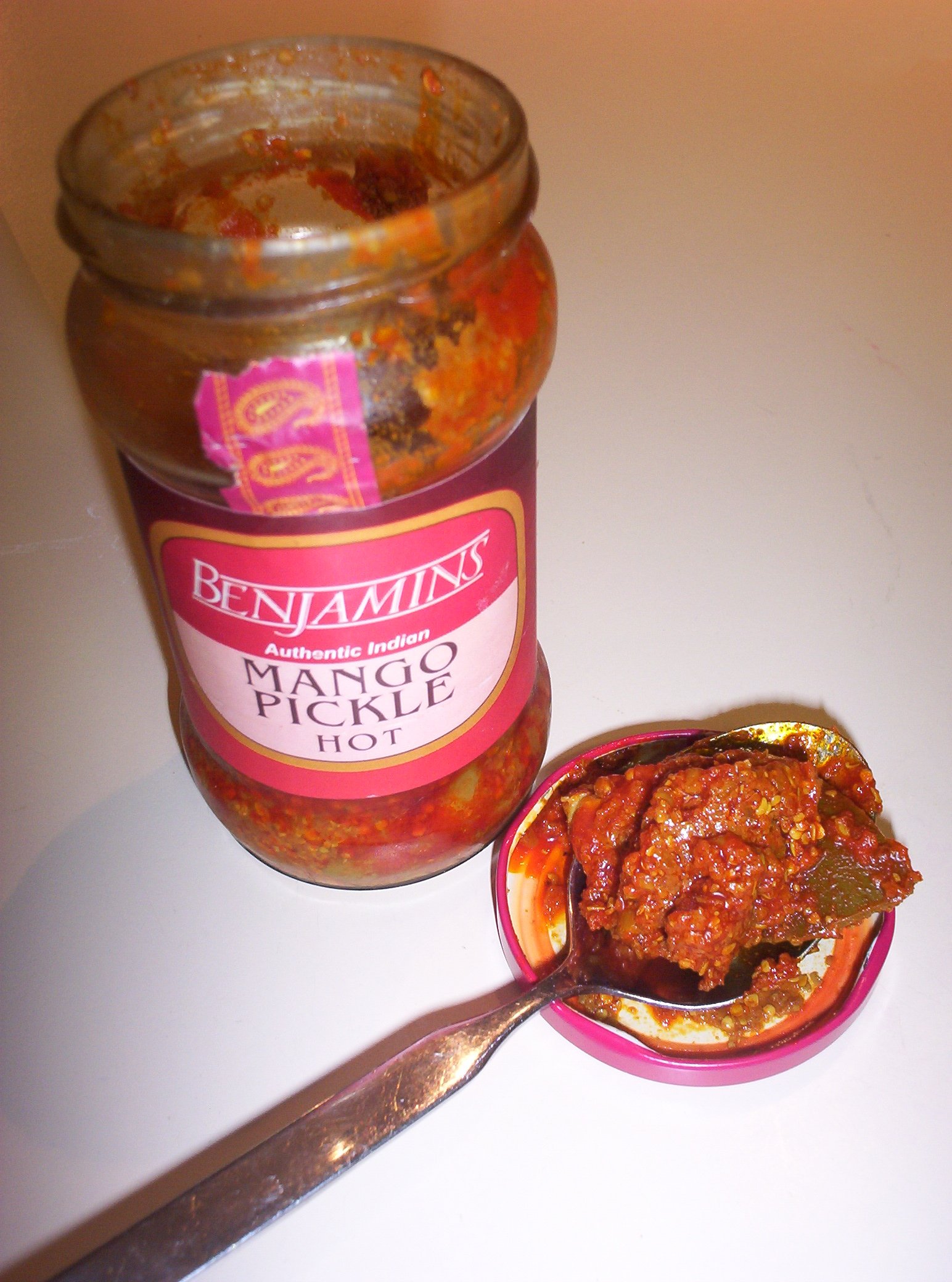Illustrative Indian mango pickle and spices